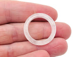 Clear Quartz Crystal ring by GemstoneGO featuring a polished, faceted quartz gemstone set in a silver band.