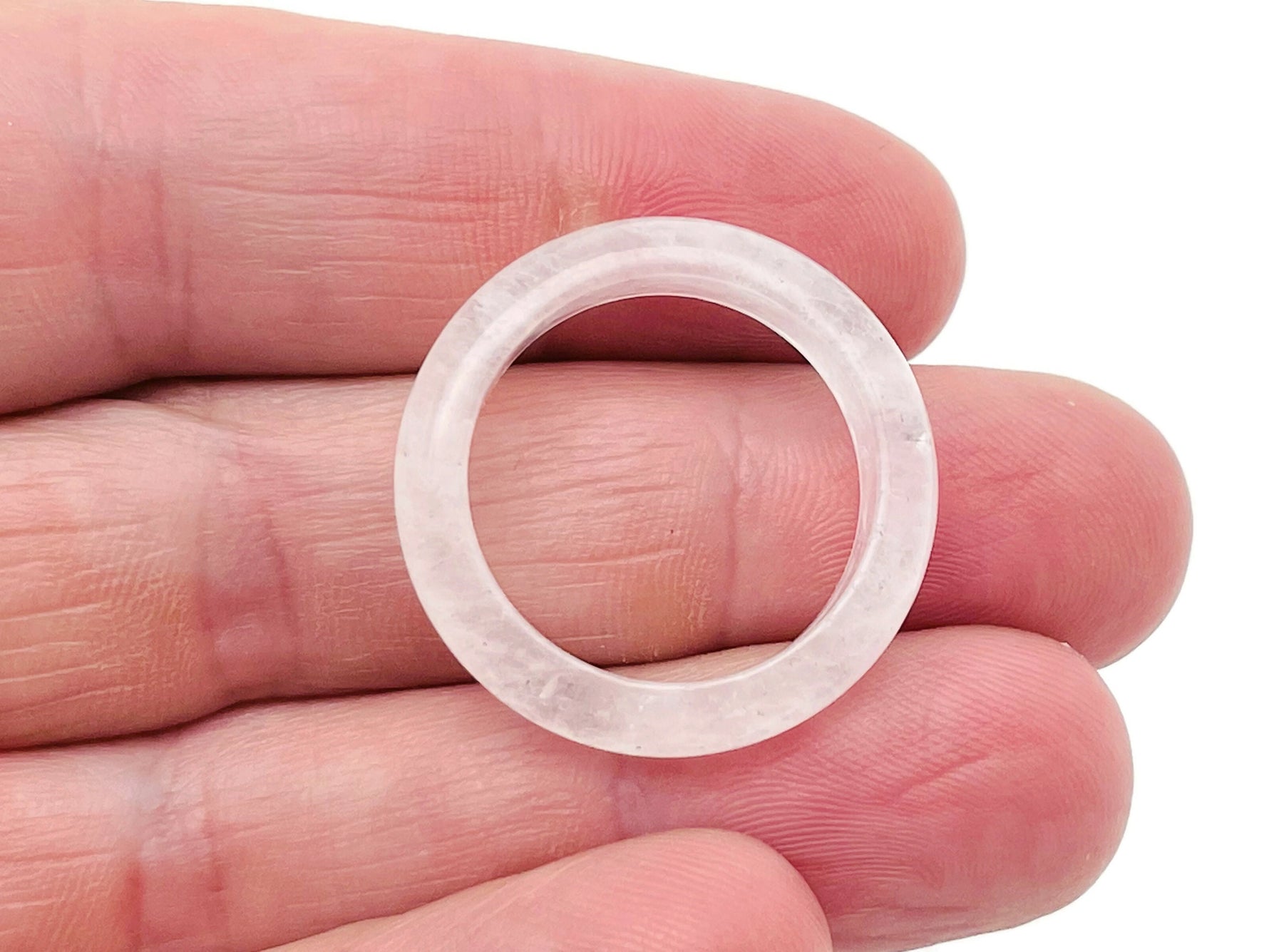 Clear Quartz Crystal ring by GemstoneGO featuring a polished, faceted quartz gemstone set in a silver band.