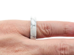 Howlite crystal ring from GemstoneGO featuring a polished white gemstone set in a silver band.