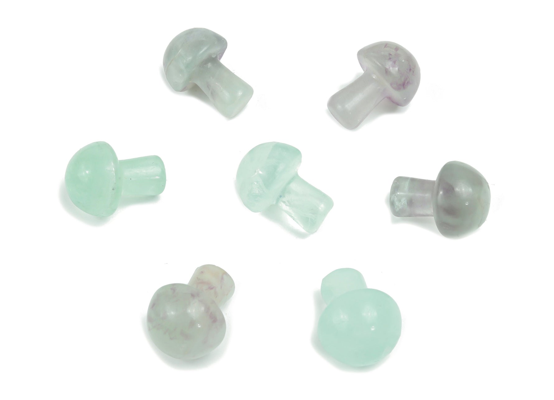 20mm fluorite mushroom carved gemstone from GemstoneGO, showing vibrant purple and green hues with detailed mushroom carving.