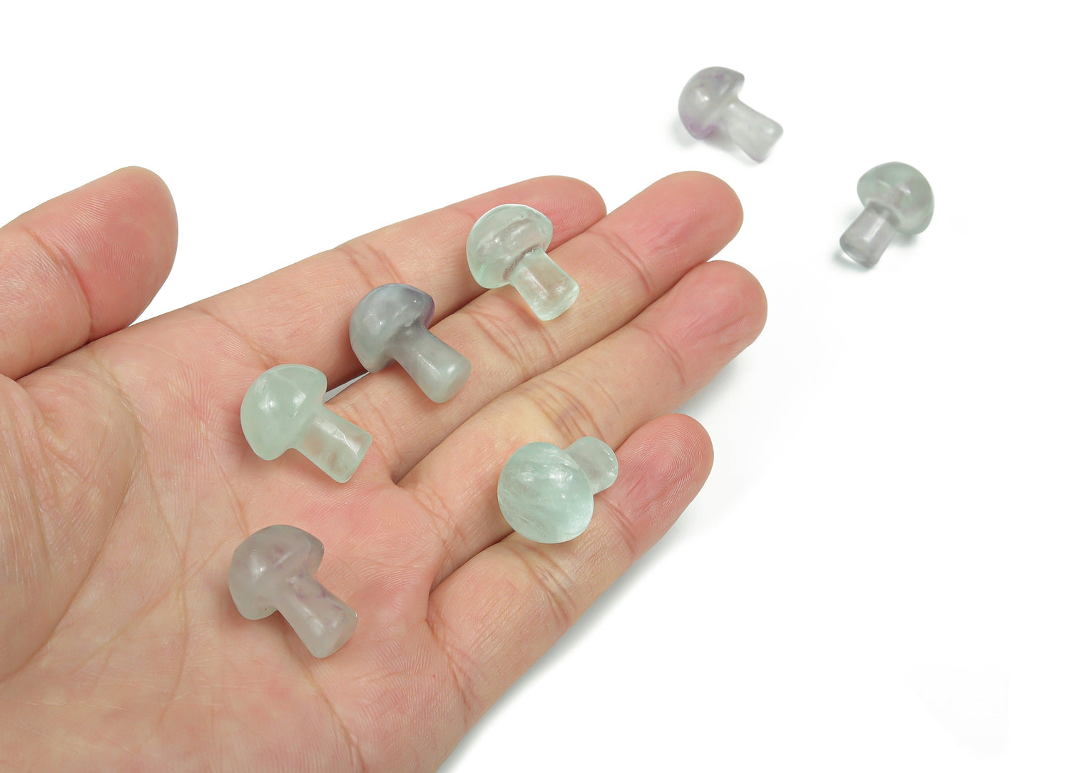 20mm fluorite mushroom carved gemstone from GemstoneGO, showcasing vibrant purple and green hues with detailed mushroom carving.