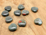 African Bloodstone heart-shaped gemstone, 30mm, from GemstoneGO, showcasing its deep green color with red bloodstone inclusions.