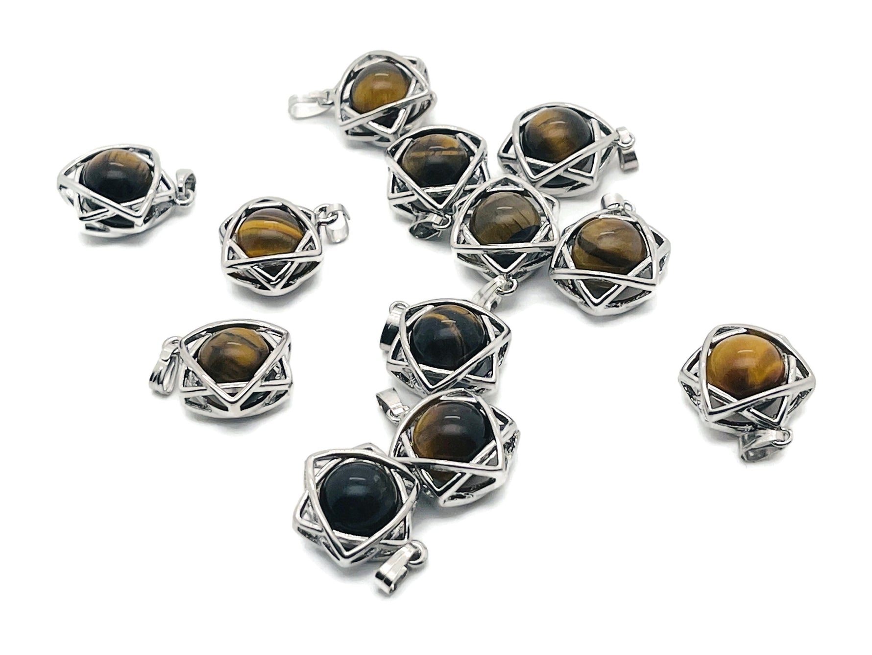 Tiger Eye crystal pendant from GemstoneGO featuring a polished, oval-shaped gemstone on a silver chain.