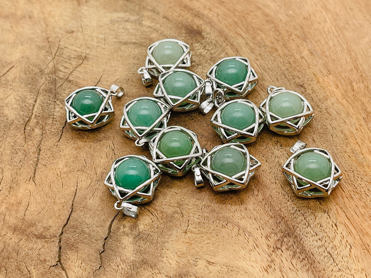 Aventurine crystal pendant necklace from GemstoneGO featuring a polished green aventurine stone on a silver chain.