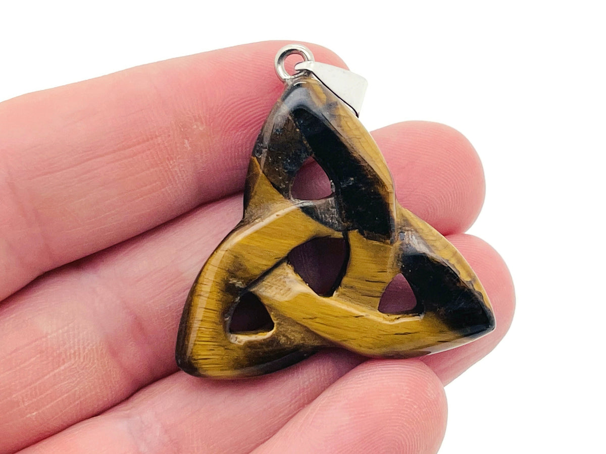 Tiger Eye Celtic Knot crystal pendant with Trinity Crystals by GemstoneGO, featuring an intricate Celtic design and polished gemstone.