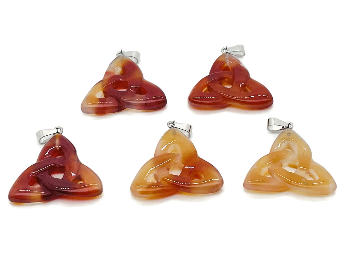 Carnelian Celtic Knot crystal pendant by GemstoneGO featuring a Trinity Crystals design on a silver chain.
