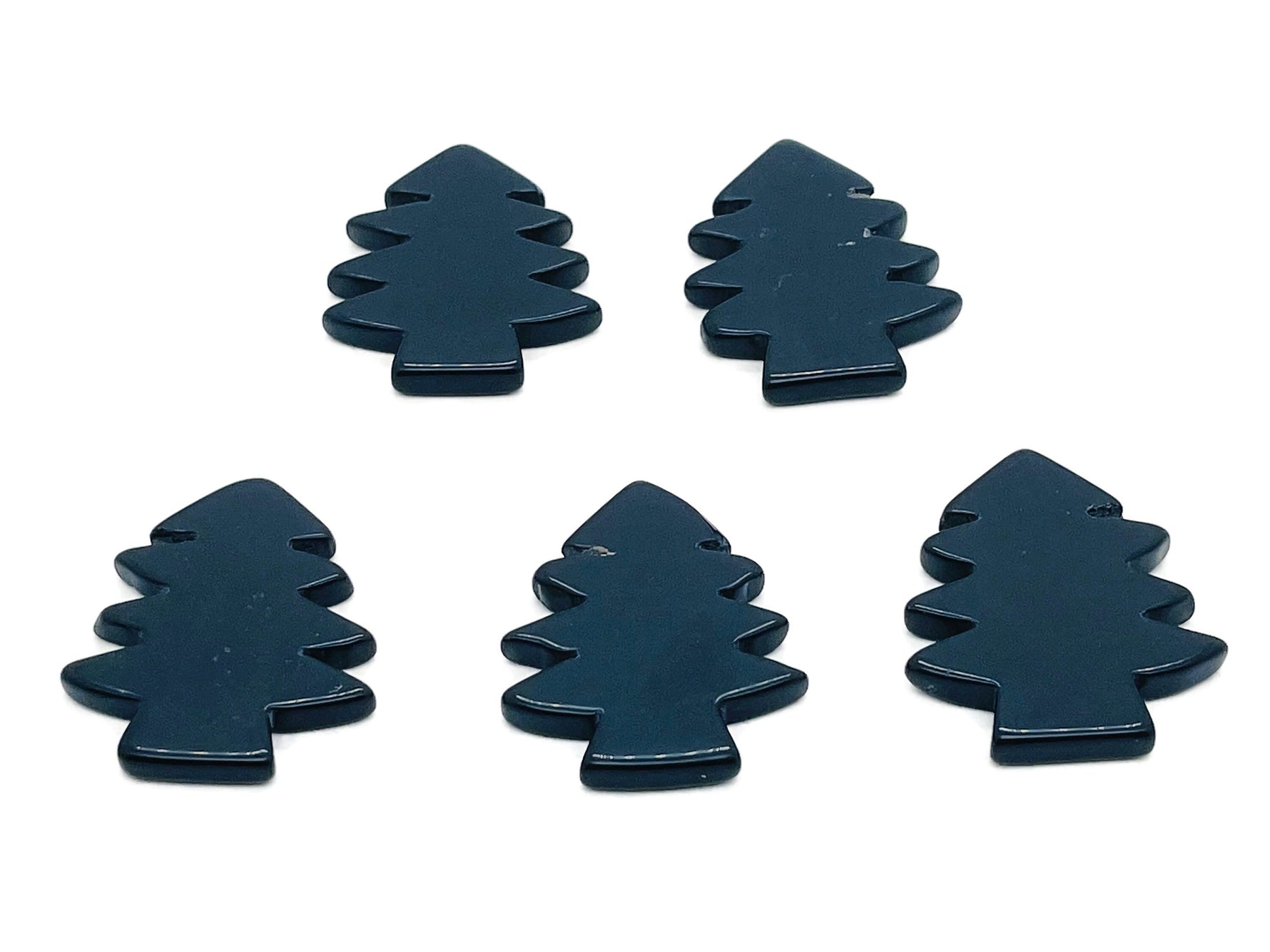 Handmade obsidian pine tree gemstone carving from GemstoneGO, featuring detailed tree design on polished black stone.
