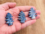 Blue Spot Jasper gemstone carved into a detailed pine tree shape, handmade by GemstoneGO, showcasing natural blue and earthy tones.
