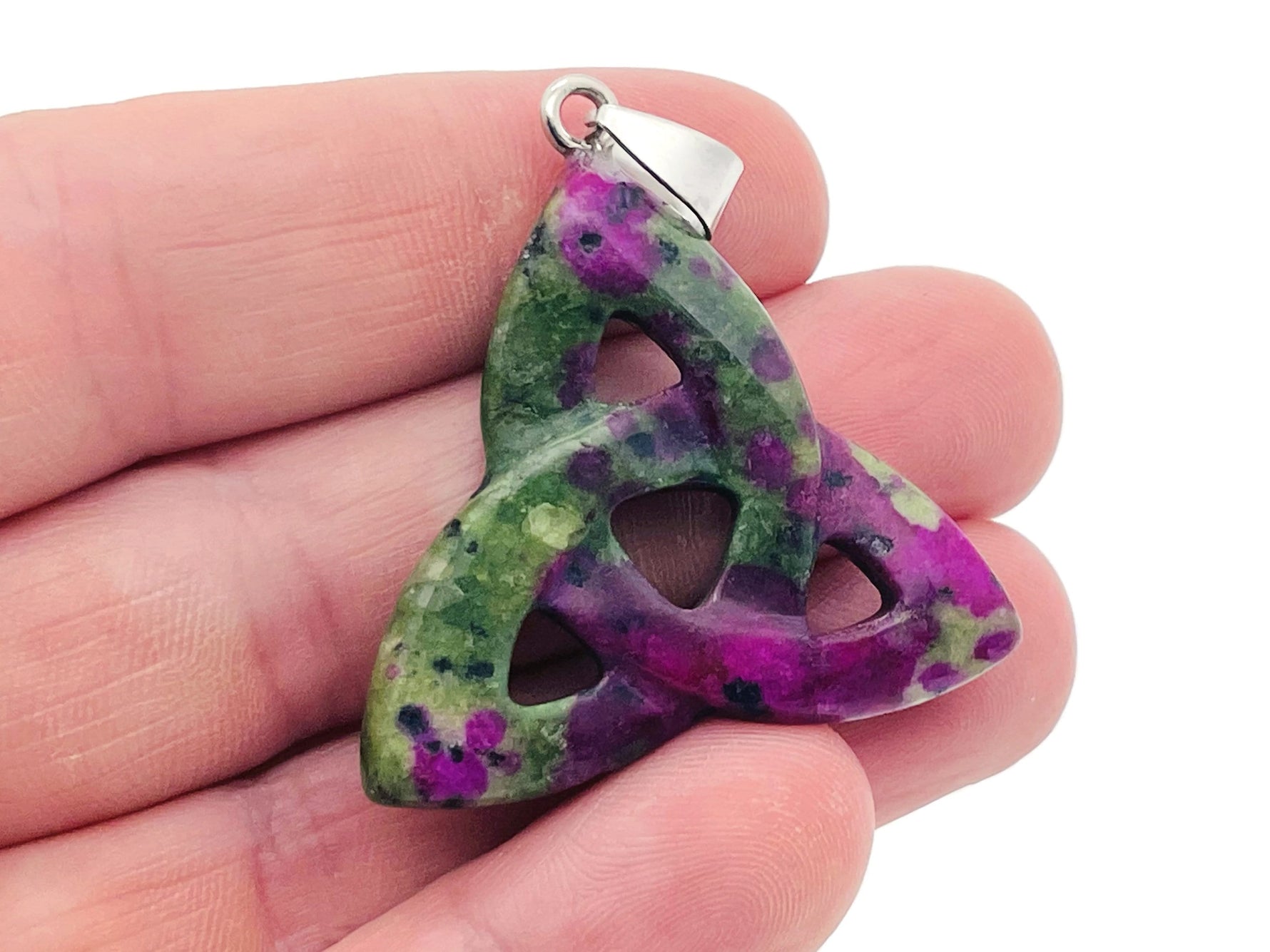 Celtic Knot Crystal Pendant with Trinity Crystals, gemstone jewelry featuring intricate design and sparkling gemstones.