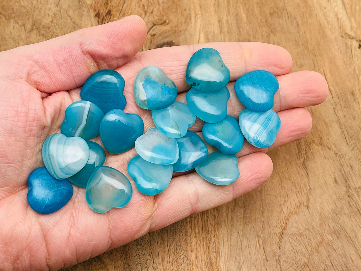 Blue agate heart-shaped gemstone pendant, 20x20x6mm, from GemstoneGO, showcasing polished, vibrant blue stone with natural banding.