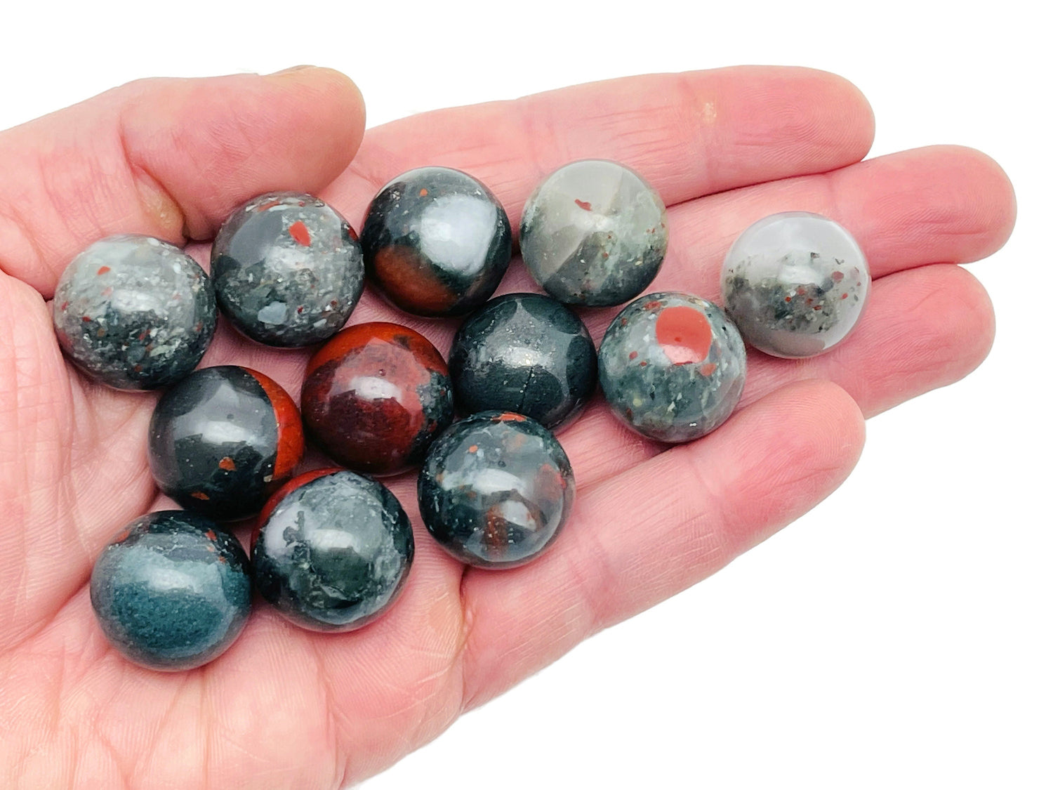 20mm African Bloodstone sphere gemstone with deep green and red patterns, polished crystal ball for meditation or decor.