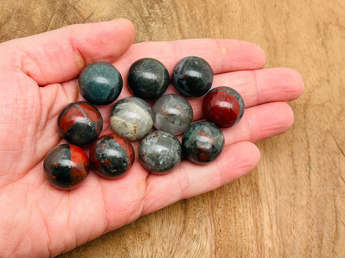 20mm African Bloodstone sphere gemstone with rich green and red mineral patterns, polished crystal ball for meditation or decor