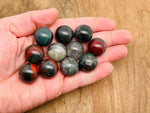 20mm African Bloodstone sphere gemstone with rich green and red mineral patterns, polished crystal ball for meditation or decor