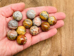 20mm Crazy Lace Agate gemstone sphere from GemstoneGO, featuring vibrant Mexican agate patterns and a polished crystal ball finish.