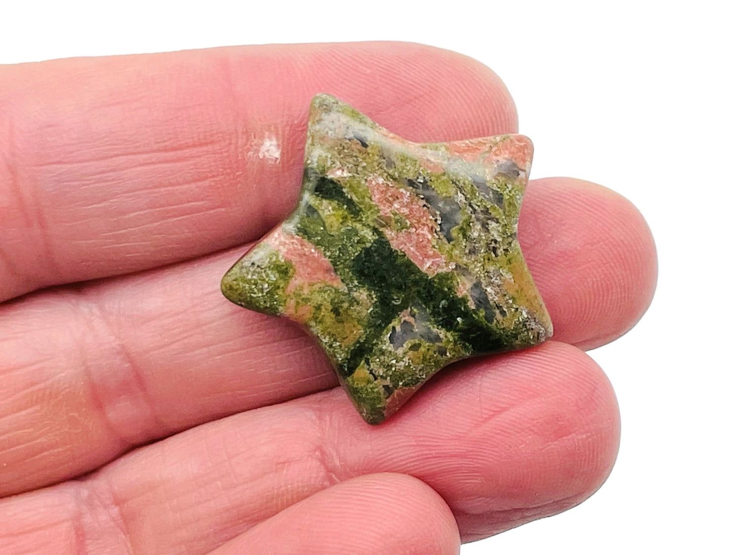 Unakite star-shaped gemstone, 30mm, from GemstoneGO, showcasing natural pink and green mottled patterns on a polished surface.