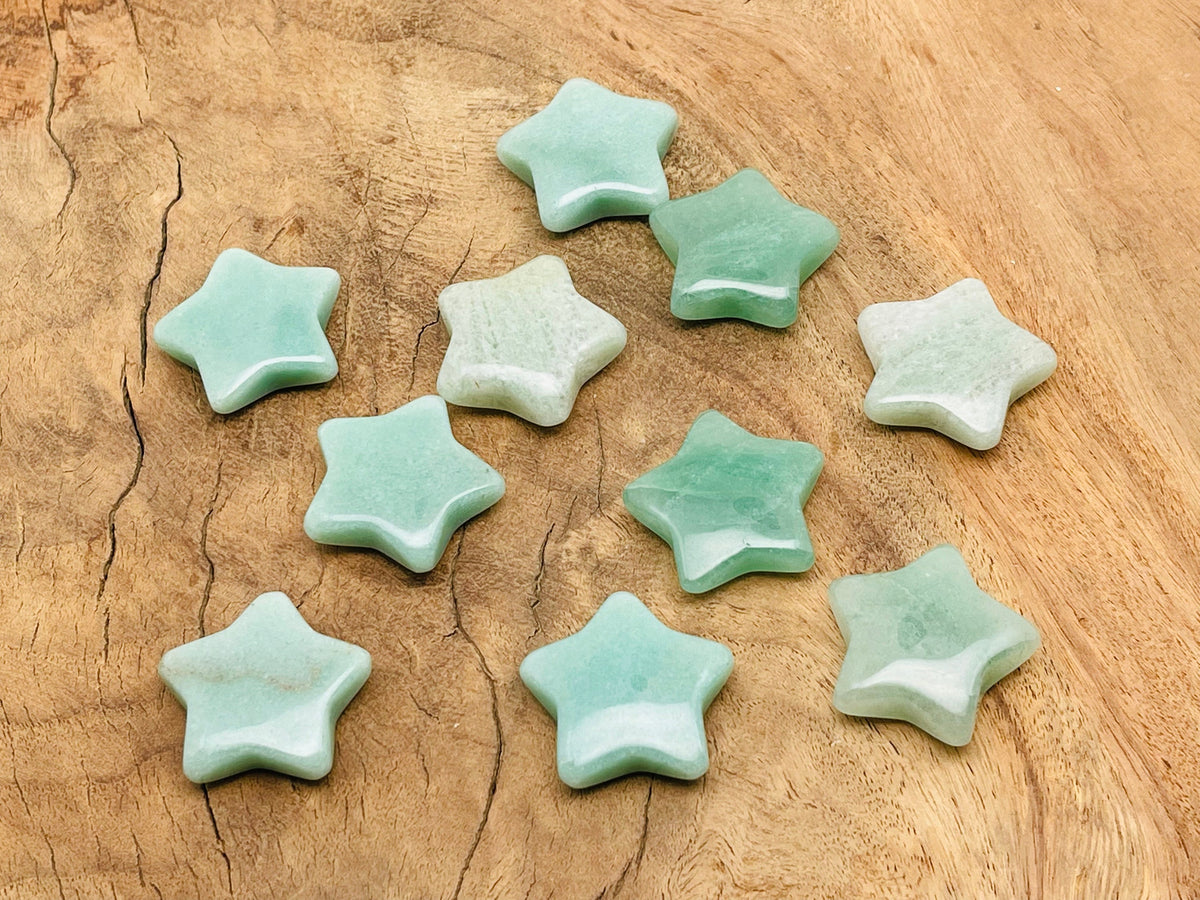 30mm Aventurine star gemstone from GemstoneGO, showcasing a polished green stone with natural star pattern and smooth surface.