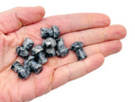 Larvikite mushroom carved gemstone, 20mm, from GemstoneGO, showcasing a polished, natural dark stone with subtle blue flashes.
