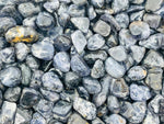 Semi-tumbled Iolite crystal chips in 7-12mm, natural gemstone bulk stones from GemstoneGO, showcasing deep blue and violet hues.