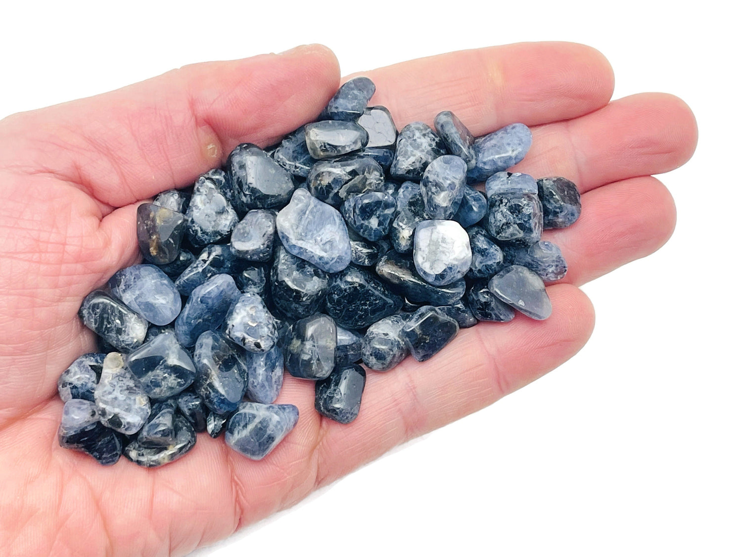 Semi-tumbled Iolite crystal chips, 7-12mm, bulk gemstone stones from GemstoneGO, showcasing vibrant blue-purple hues and natural texture.