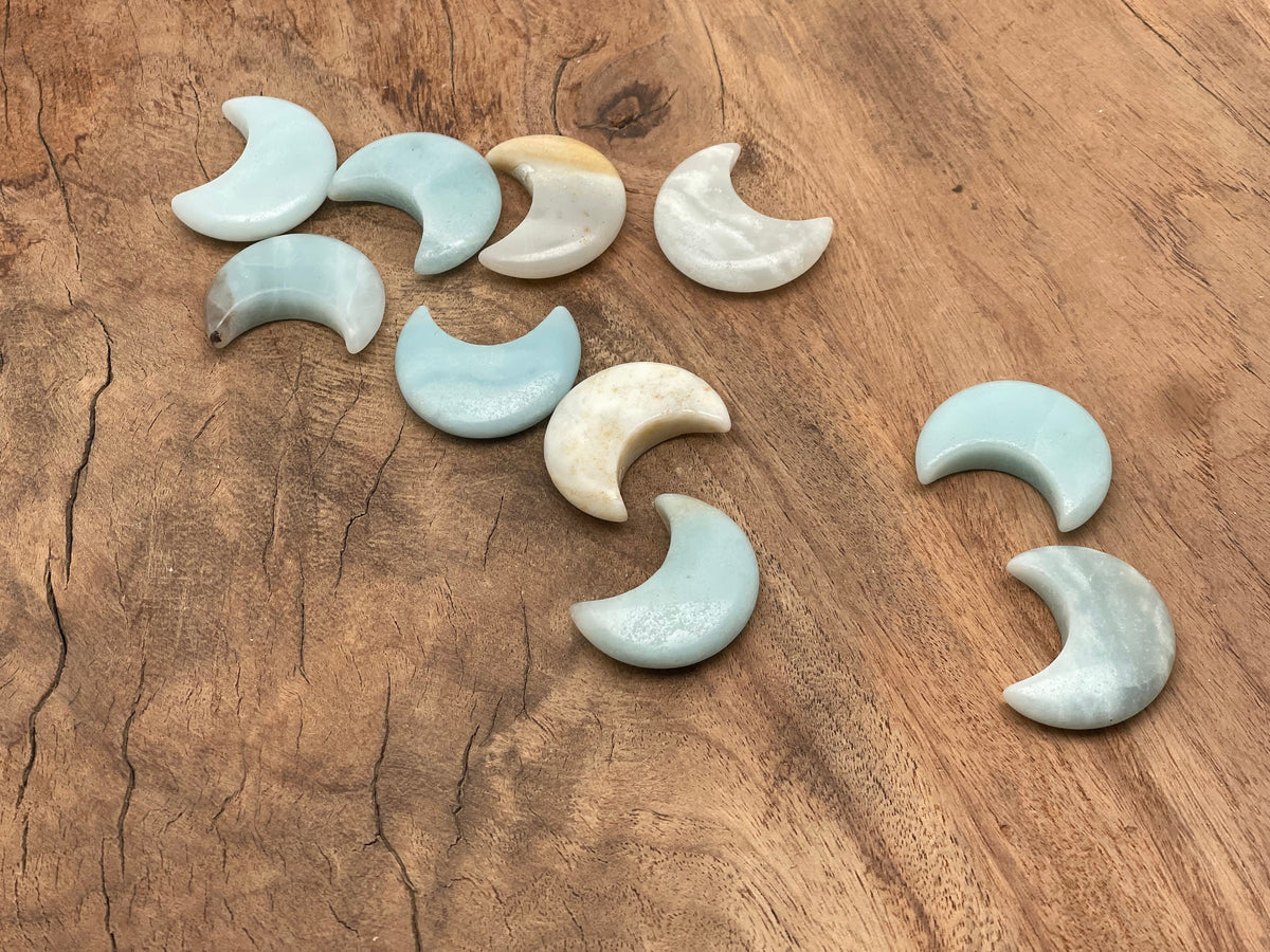 Amazonite gemstone moon pendant, 30mm, from GemstoneGO featuring smooth, polished blue-green stone with natural patterns.