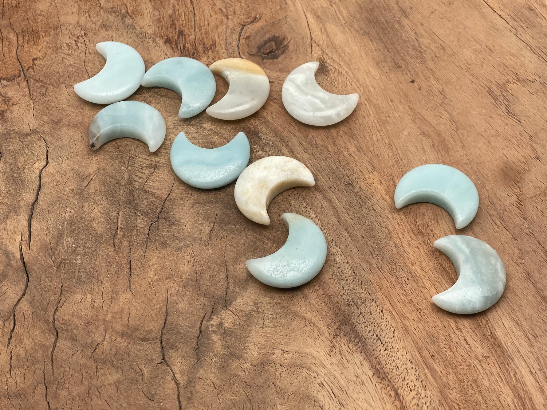 Amazonite gemstone moon pendant, 30mm, from GemstoneGO featuring smooth, polished blue-green stone with natural patterns.