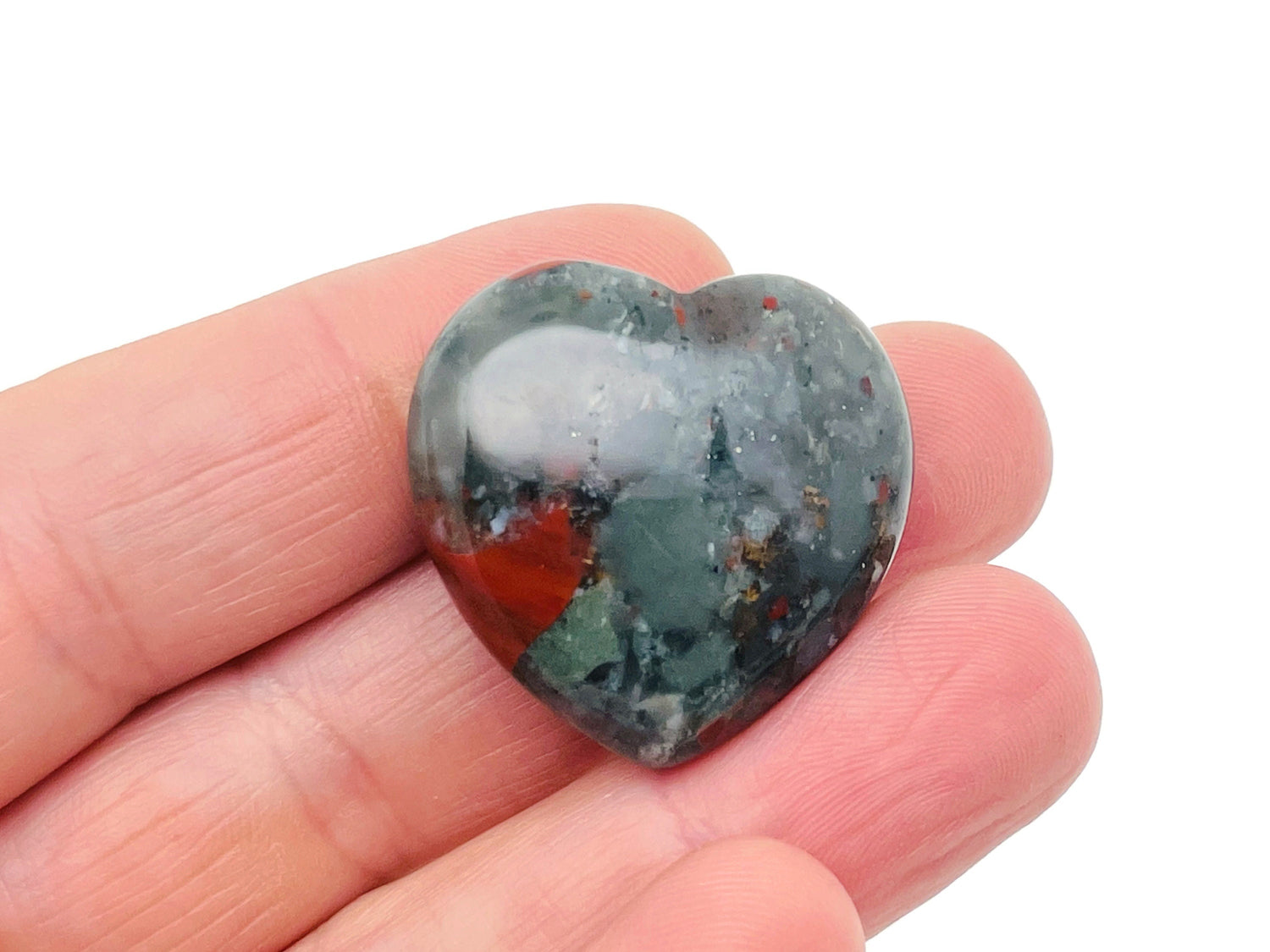 African Bloodstone heart-shaped gemstone pendant, 30mm, from GemstoneGO, showcasing its rich green color with red bloodstone inclusions.