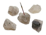 Handmade smoky quartz rough crystal incense holder with carved design, ideal for holding incense sticks in a natural gemstone setting.