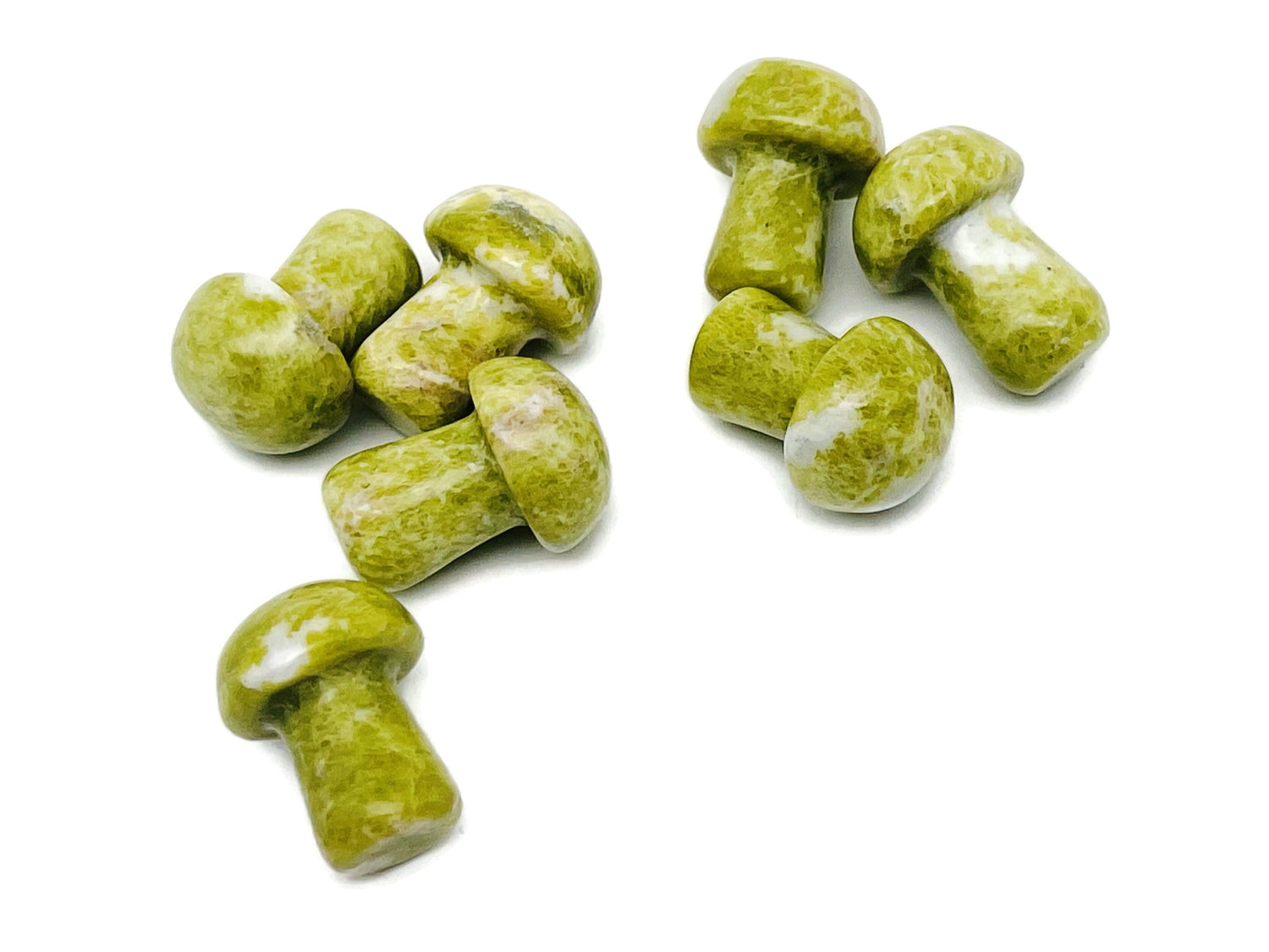 20mm Jade Mushroom carved gemstone from GemstoneGO, showcasing a smooth, polished green stone with intricate mushroom design.