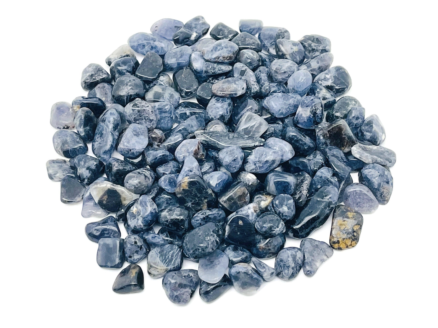 Iolite crystal chips from GemstoneGO, semi-tumbled stones in 7-12mm size, showcasing vibrant blue-purple hues and natural mineral texture.
