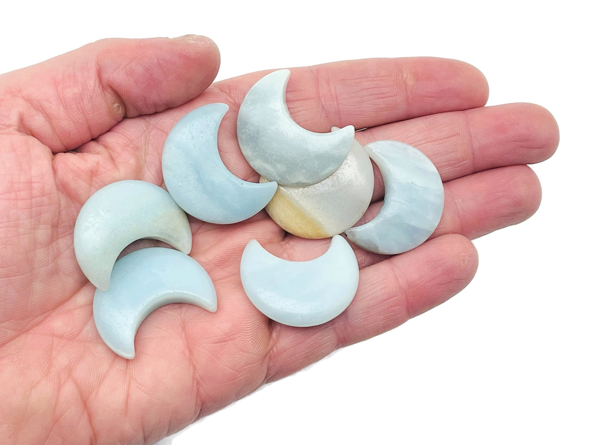 Amazonite gemstone moon pendant, 30mm, from GemstoneGO, showcasing a smooth, polished blue-green stone in moon shape.