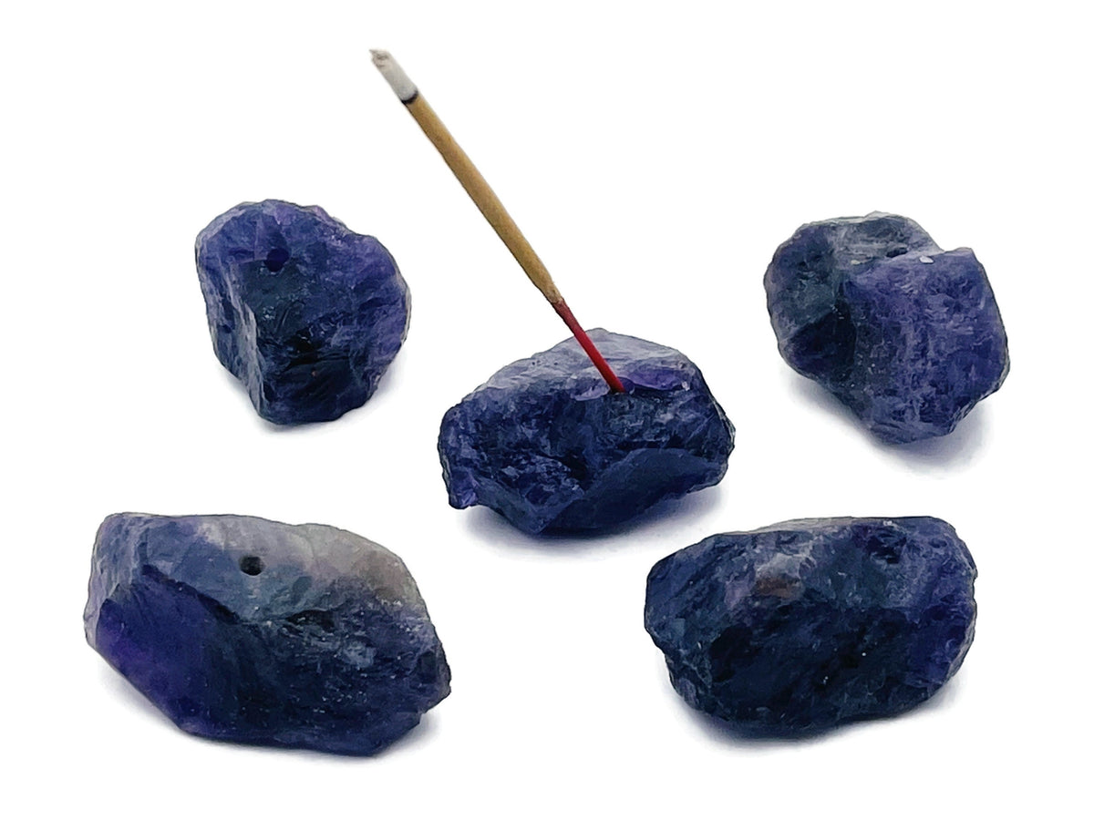 Handmade amethyst rough crystal incense holder with carved design, ideal for holding incense sticks and enhancing spiritual decor.