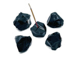Handmade obsidian rough crystal incense holder with carved design, suitable for holding incense sticks.