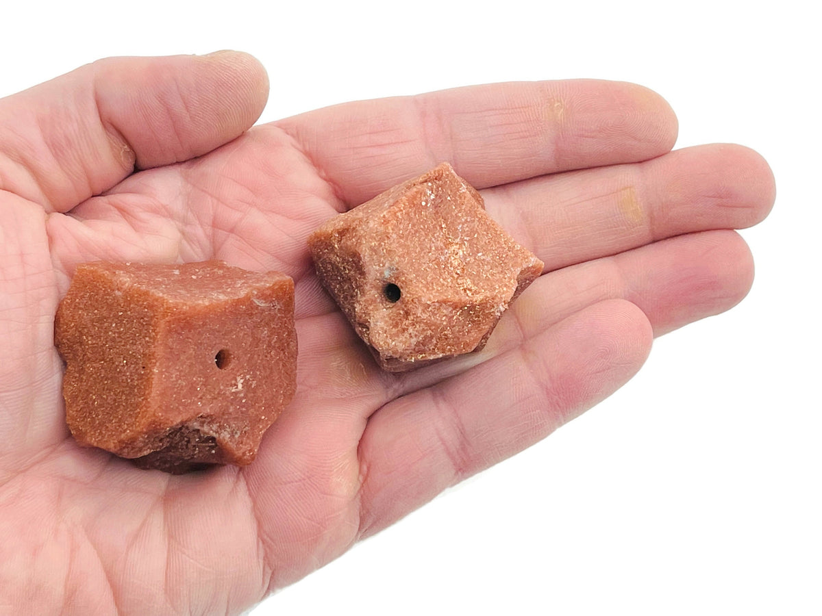 Handmade goldstone rough crystal incense holder with carved design, perfect for holding incense sticks in a decorative manner.