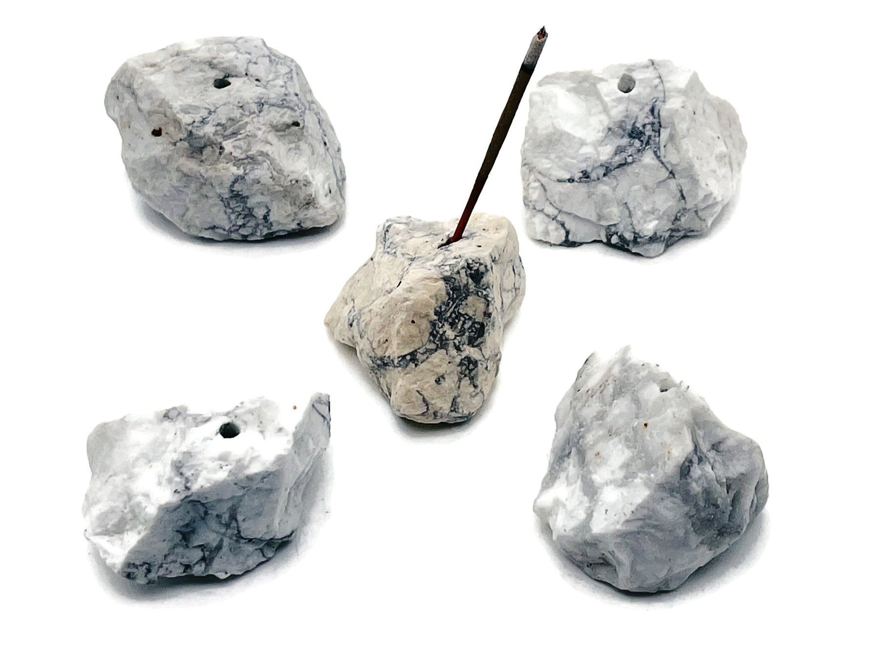 Handmade Howlite rough crystal incense holder with carved design, perfect for holding incense sticks and showcasing gemstone craftsmanship.
