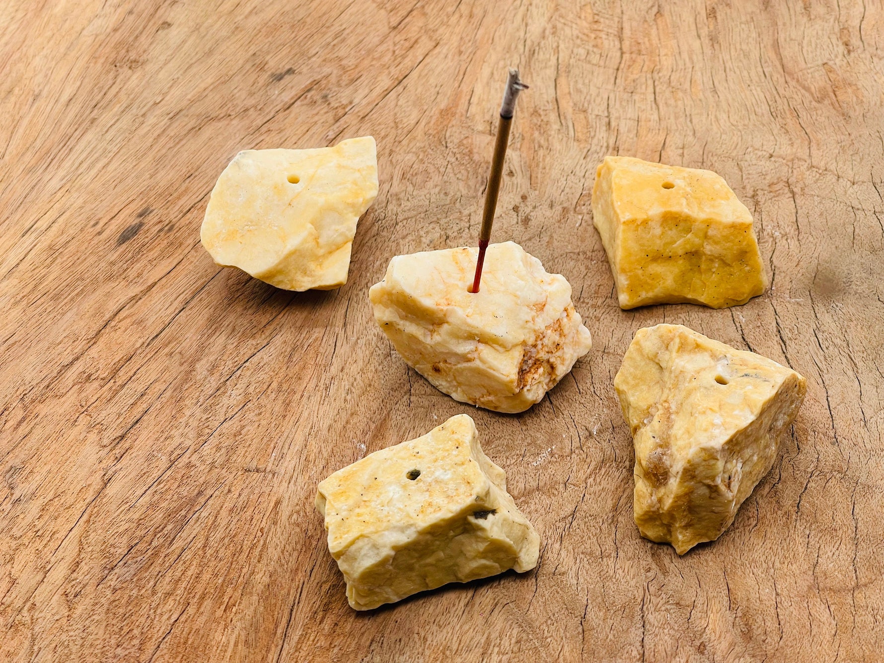 Yellow aventurine rough crystal incense holder with handmade carving, designed for incense sticks and featuring a natural gemstone finish.