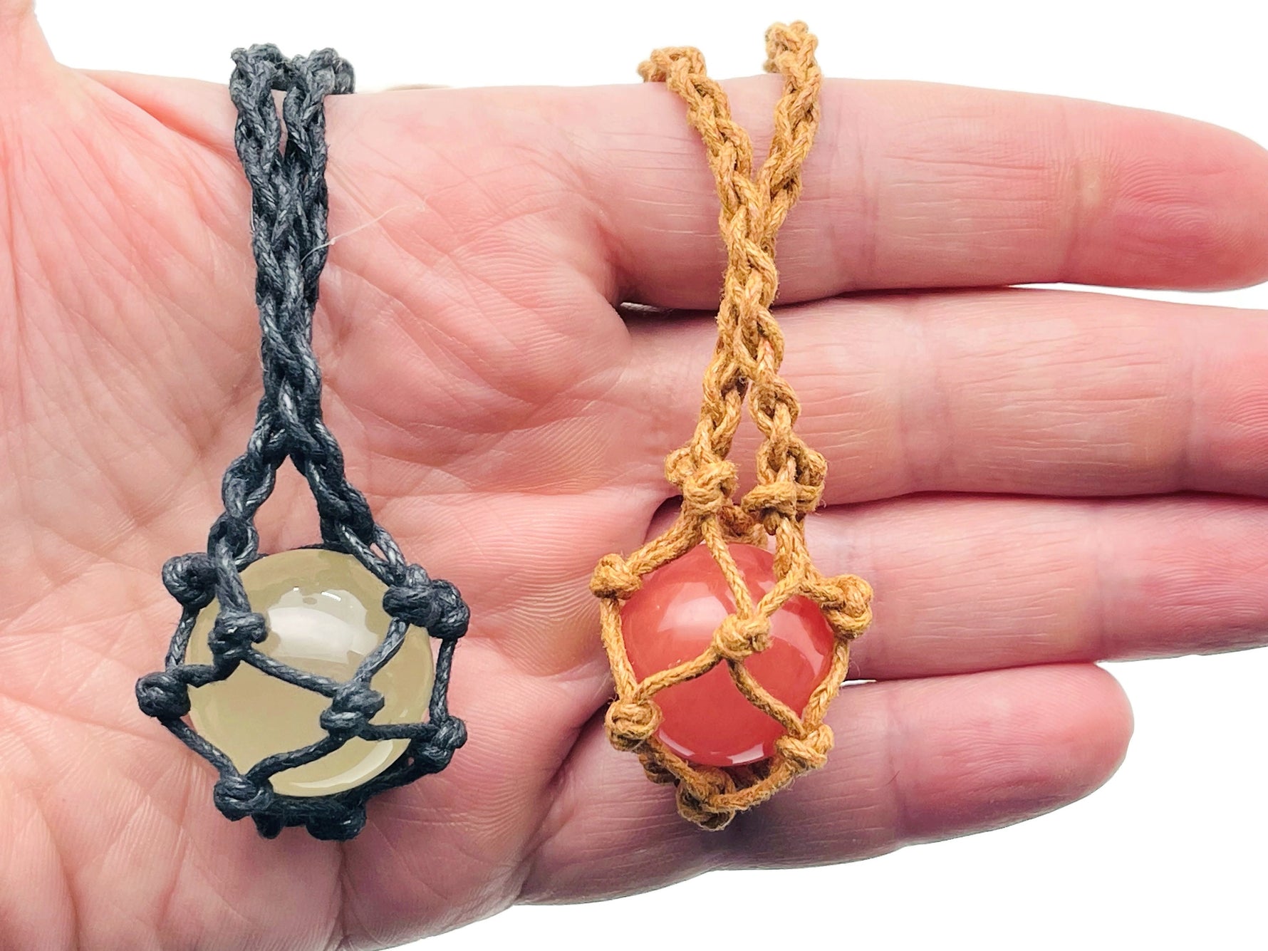 Handmade macrame crystal holder necklace by GemstoneGO with an empty pouch, featuring intricate knot details and natural beige cord.