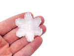 Selenite flower carving gemstone by GemstoneGO with intricate flower design and smooth polished surface.