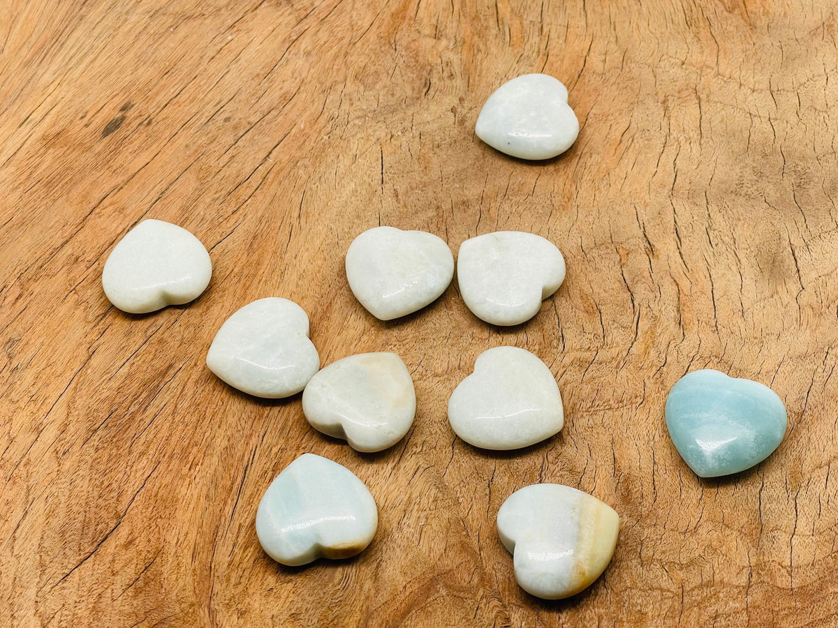 Amazonite heart-shaped gemstone pendant, 30mm, by GemstoneGO, showcasing smooth, vibrant blue-green stone with natural patterns.