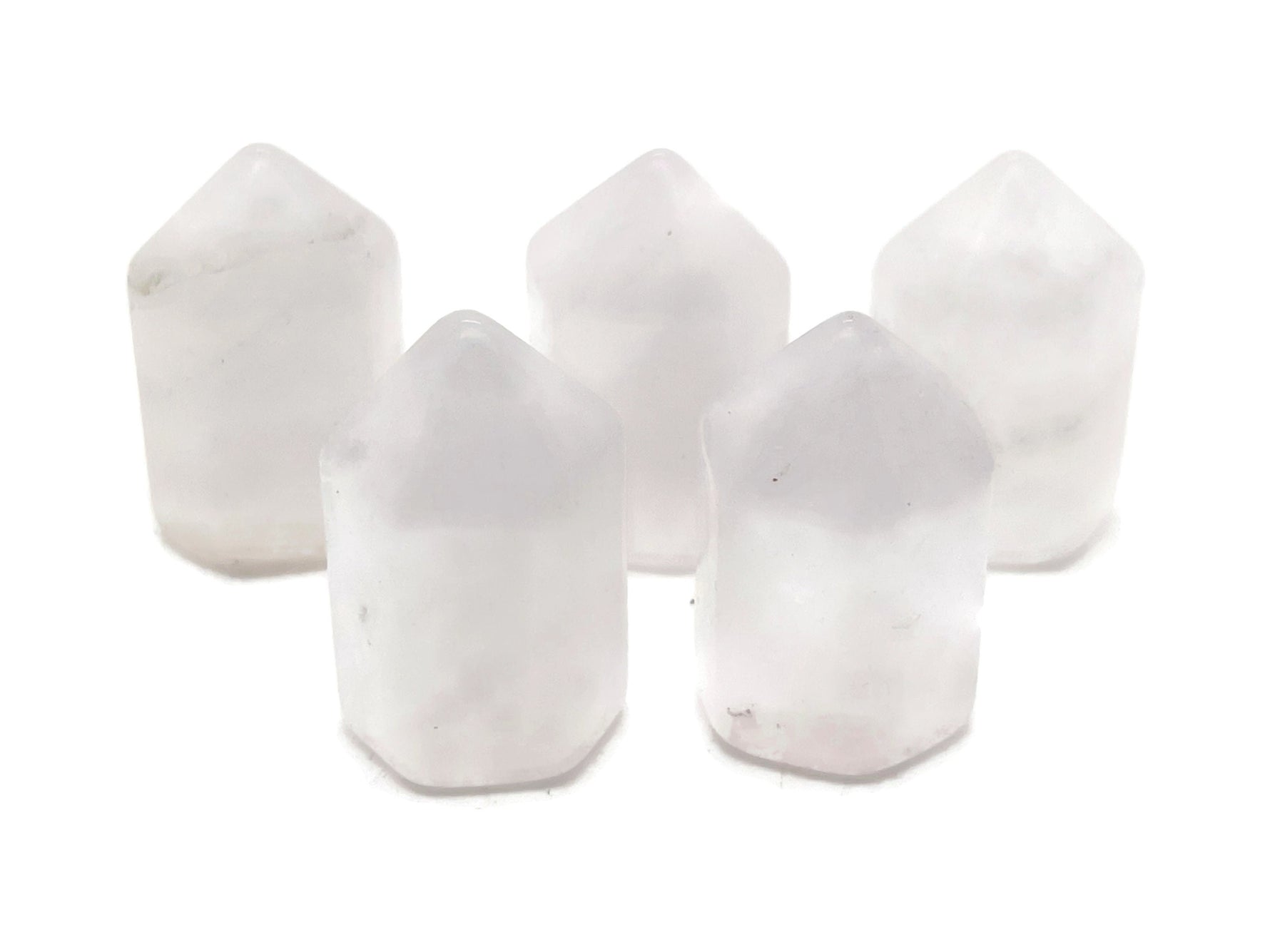 Clear Quartz obelisk tower crystal measuring 25mm from GemstoneGO, showcasing a polished, transparent gemstone with natural clarity.