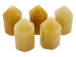 Yellow aventurine obelisk tower crystal, 25mm, from GemstoneGO, showcasing a polished yellow gemstone with natural veining.