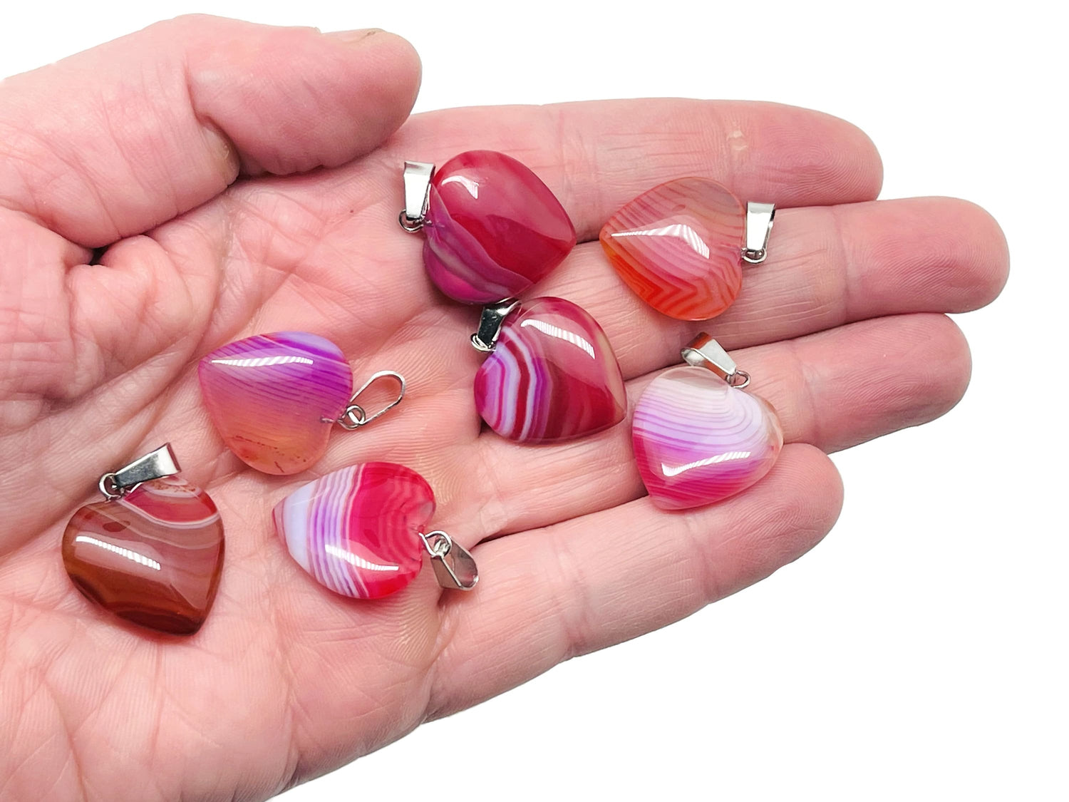Pink agate heart pendant by GemstoneGO featuring a mini crystal design, perfect for healing and gift-giving.