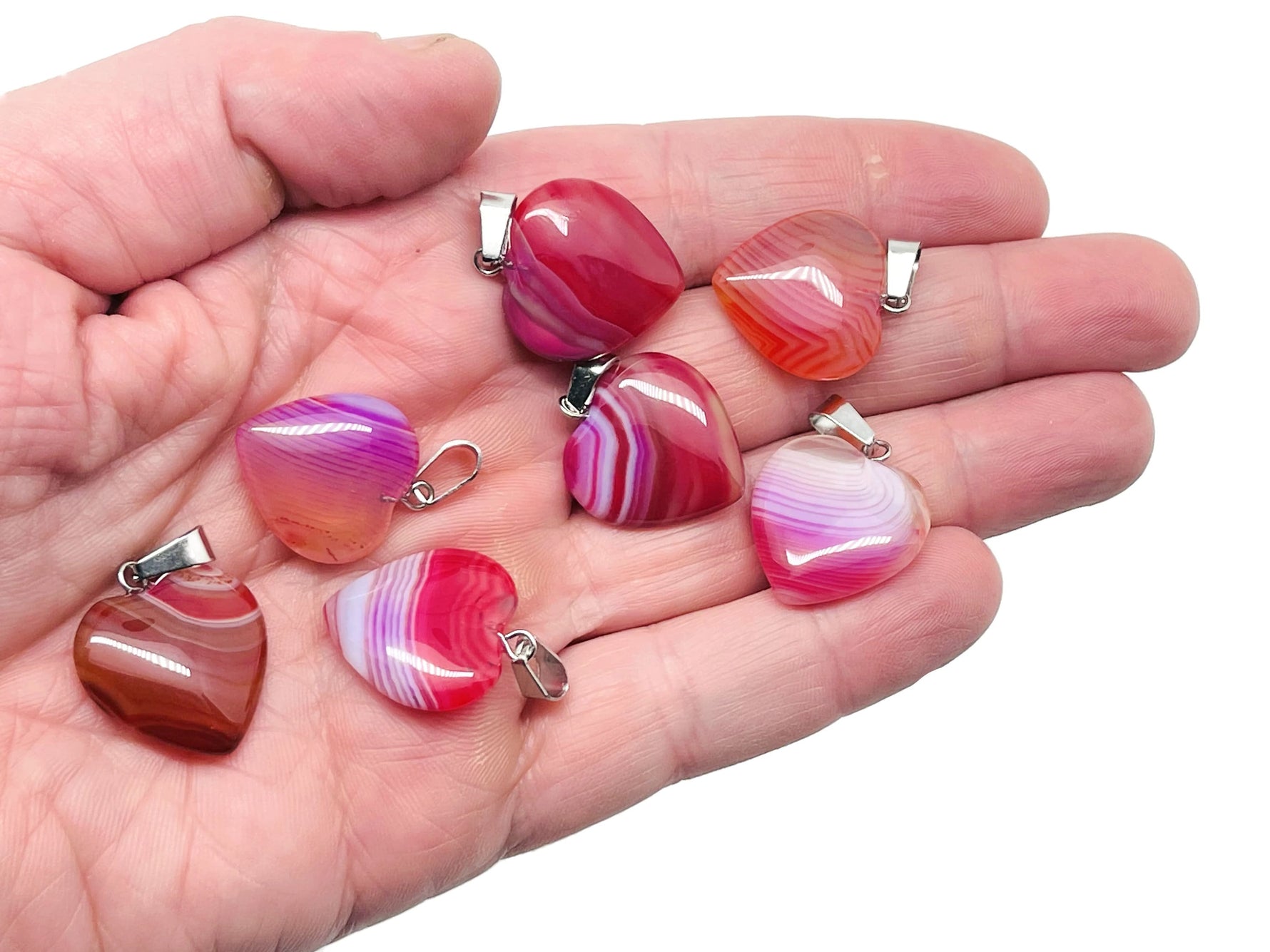 Pink agate heart pendant by GemstoneGO featuring a mini crystal design, perfect for healing and gift-giving.