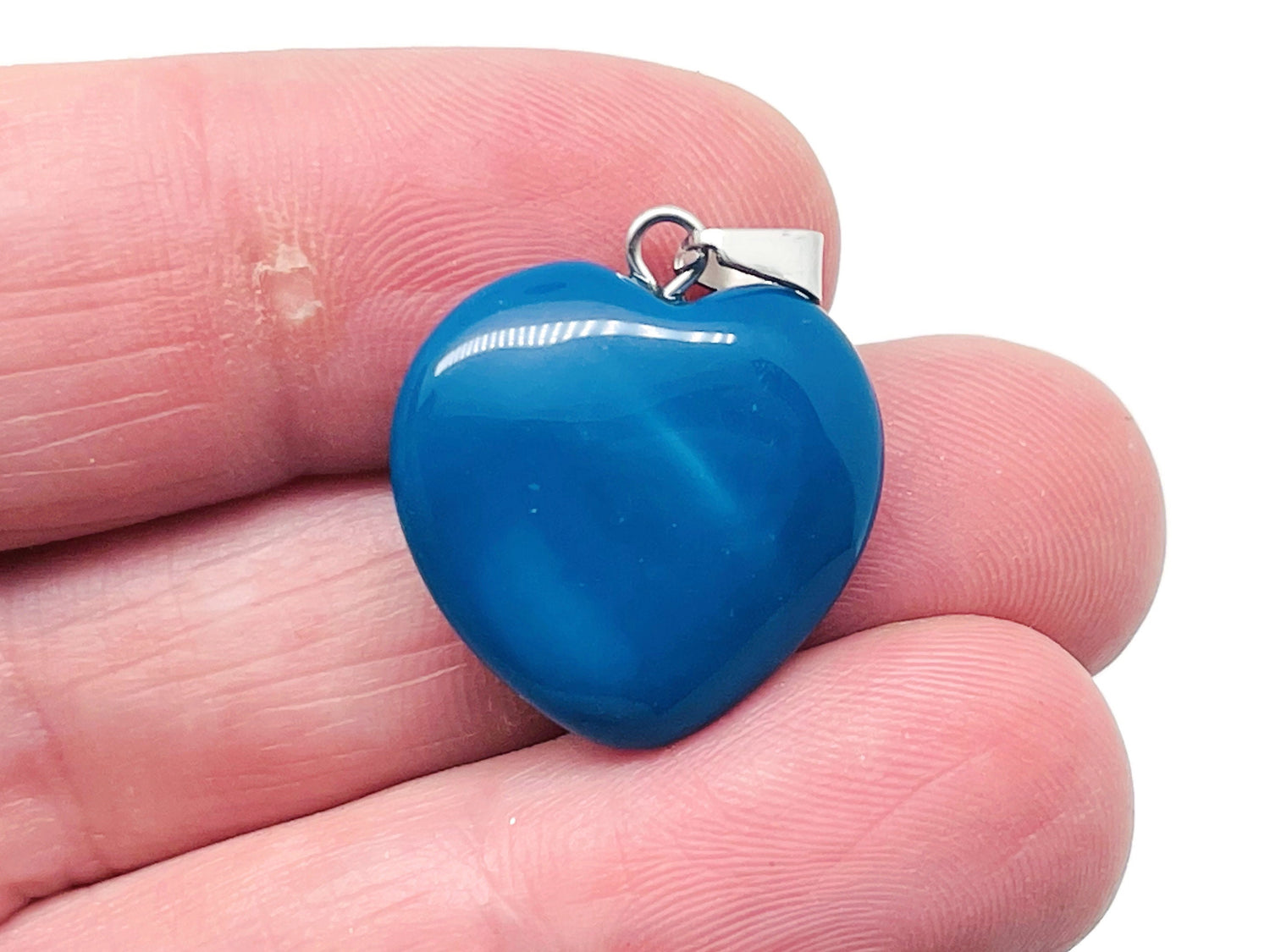 Blue agate heart pendant with crystals, handmade healing jewelry by GemstoneGO featuring a mini crystal design.