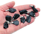 Tektite pendant featuring Tibetan Tektike meteorite gemstone, showcasing a unique natural stone on a jewelry pendant.