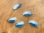 Blue natural pearl pendant from GemstoneGO, showcasing a polished pearl with a silver bail for jewelry making.