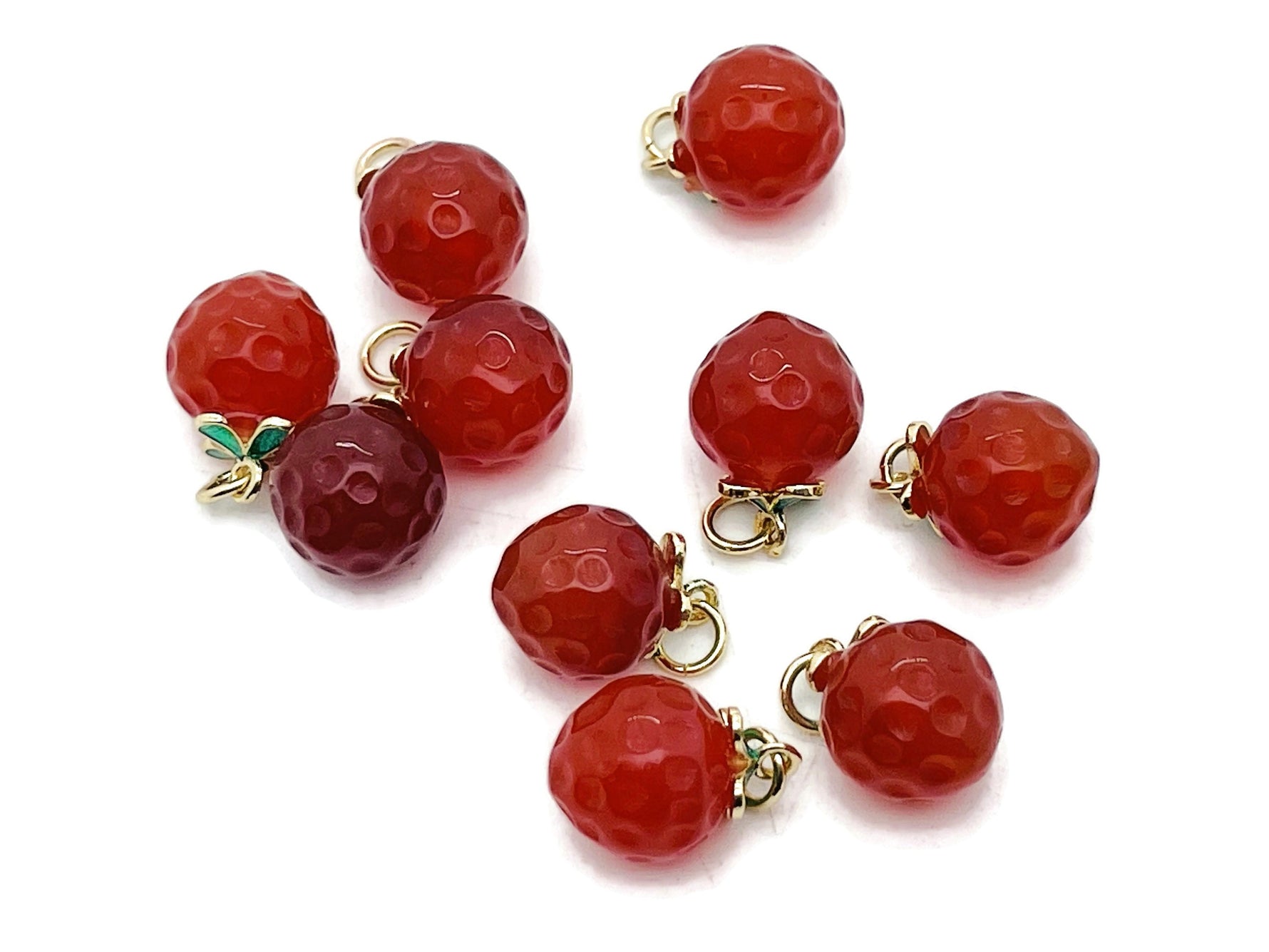 Carnelian crystal pendant from GemstoneGO, showcasing a vibrant orange gemstone with silver detailing for jewelry making.