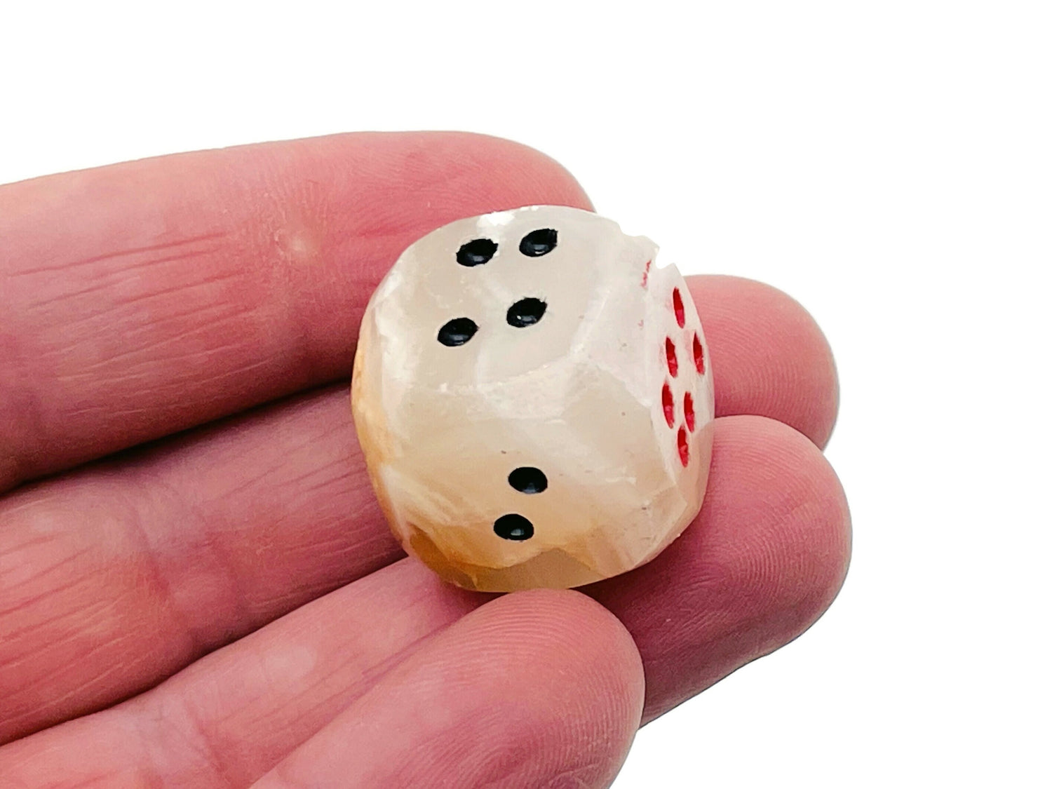 Carved Afghanistan Jade crystal dice from GemstoneGO featuring detailed gemstone craftsmanship and vibrant green hues.