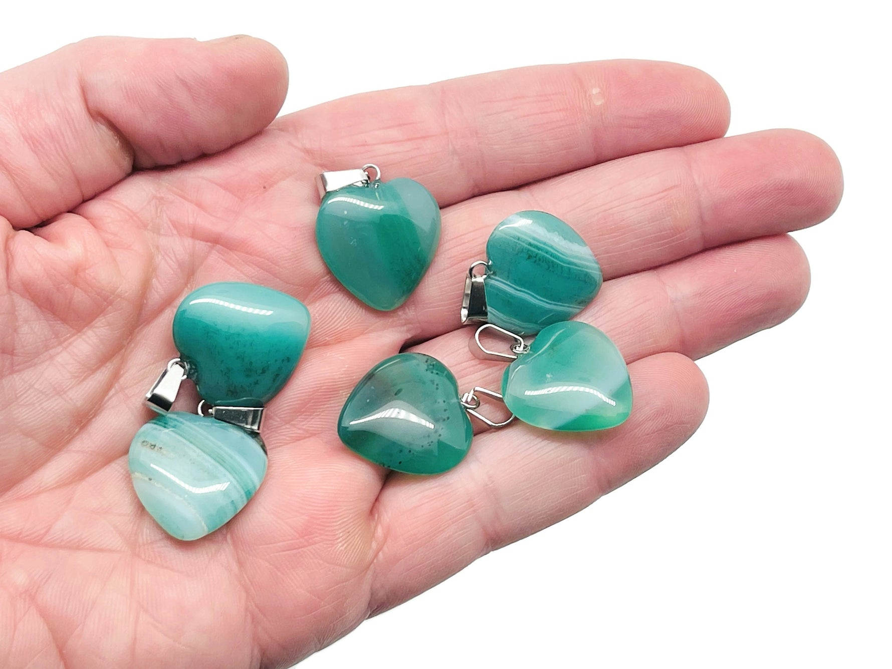 Green Agate Heart Pendant from GemstoneGO featuring a mini crystal pendant with healing properties, ideal as a gift.