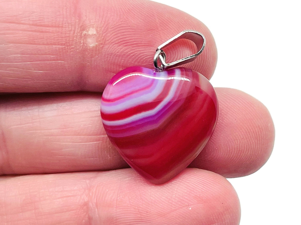 Pink agate heart pendant from GemstoneGO featuring a mini crystal design, perfect for healing and gift-giving.