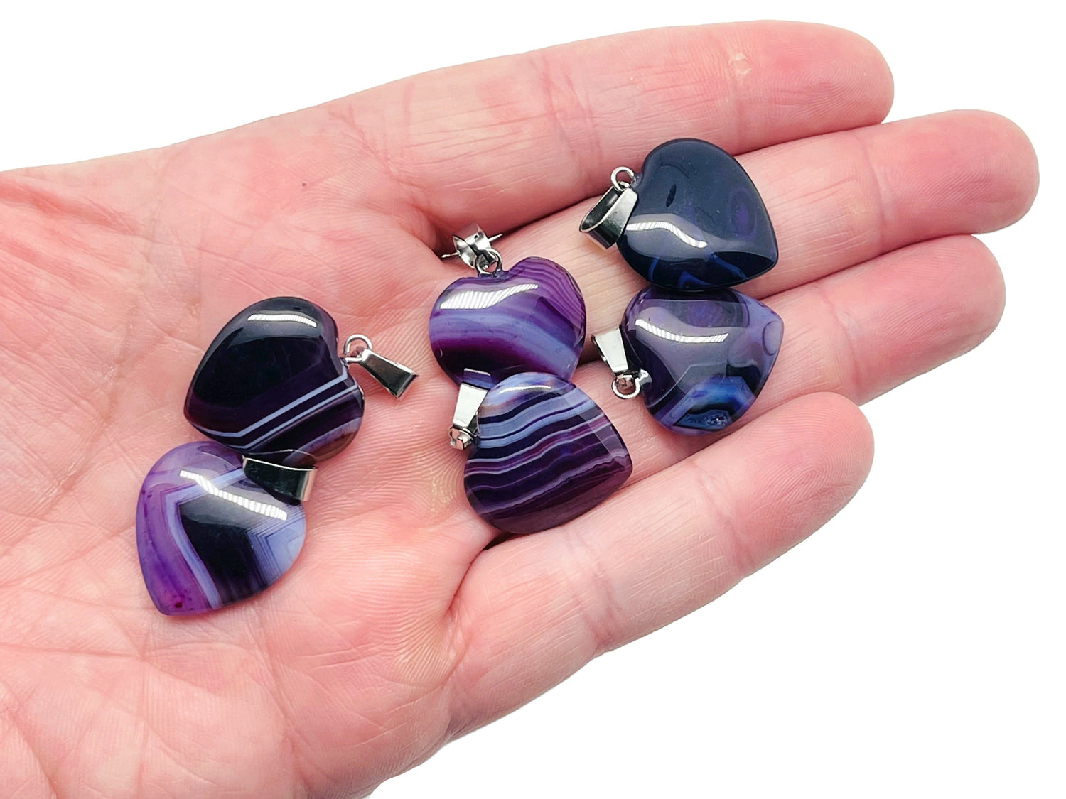 Purple agate heart pendant from GemstoneGO featuring a healing crystals design, perfect as a mini crystal gift or jewelry accessory.